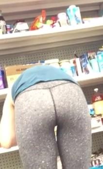 Bending Over Grey Yoga Pants Girl