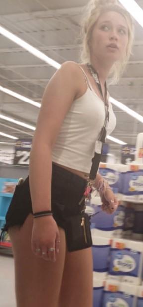 Beautiful Skinny Blonde In Black Shorts