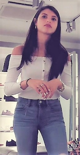 Beautiful Brunette Teen In Jeans Bending Over