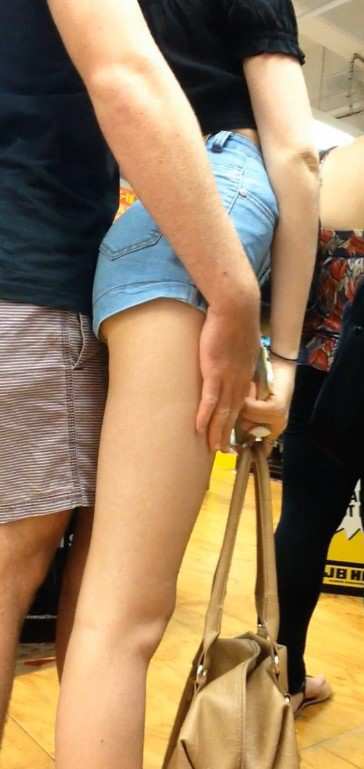 Candid Teen In Shorts With BF