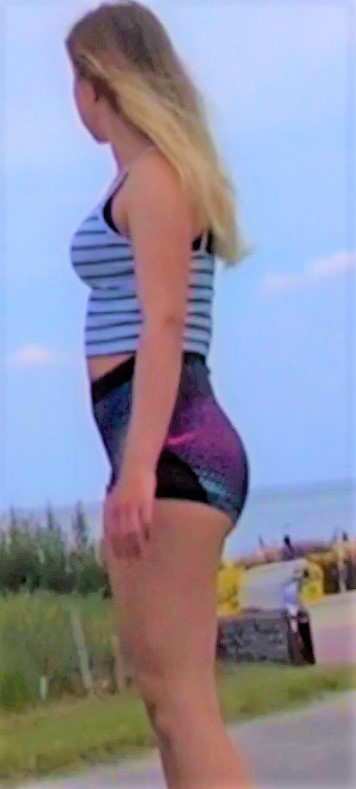 Hot Blonde In Spandex Shorts Touching Her Ass