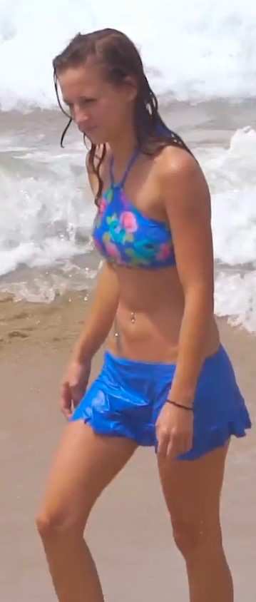 Candid Teen Having Fun In The Beach