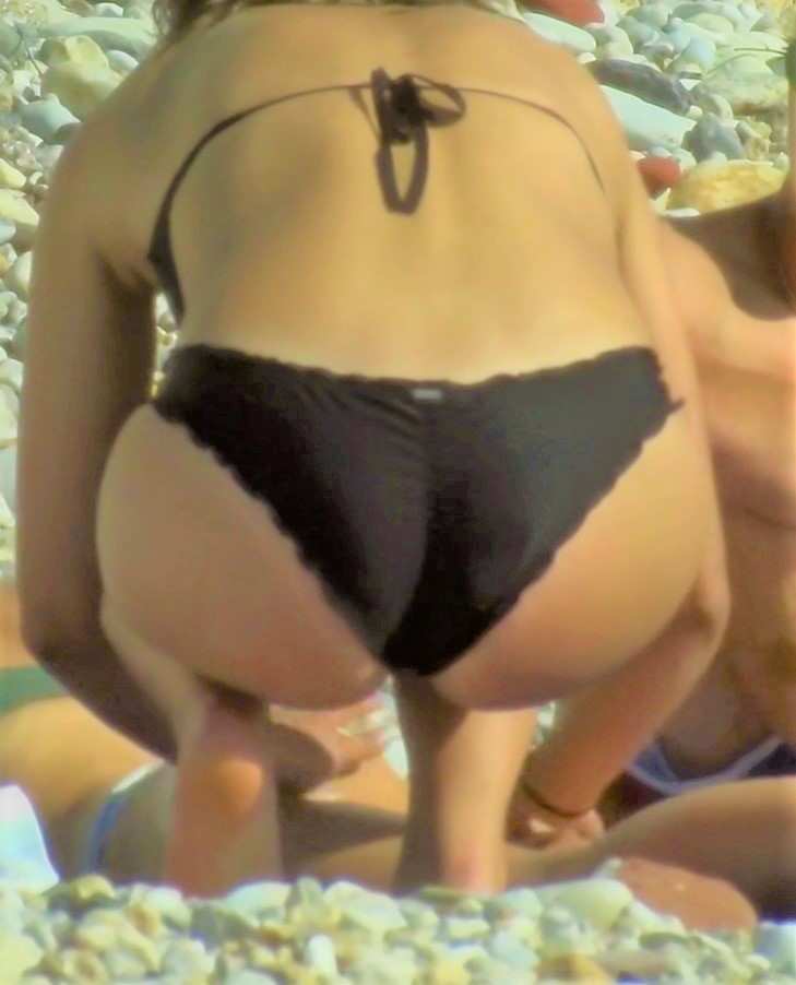 Black Bikini Babe Giving Massage