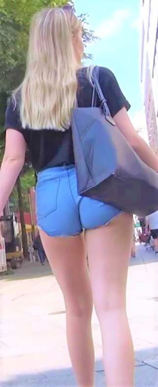 Following a Sexy Walk Blonde In Tight Shorts