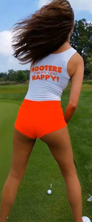 Sexy Hooters Girl Playing Golf