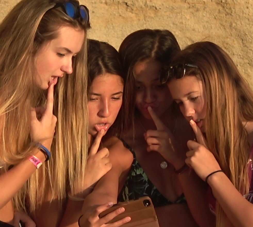 Young Candid Teens Taking Selfies