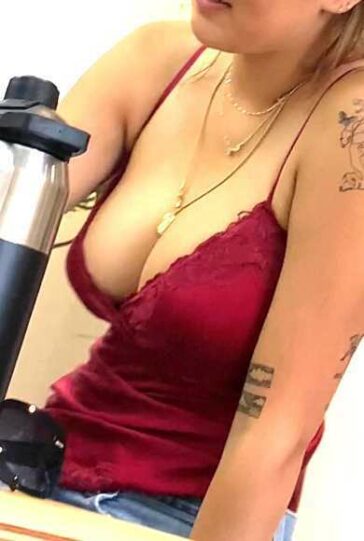 Huge Tits Spilling Out Her Top