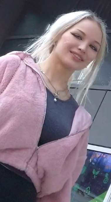 Beautiful Face Blonde Teen In Black Leggings