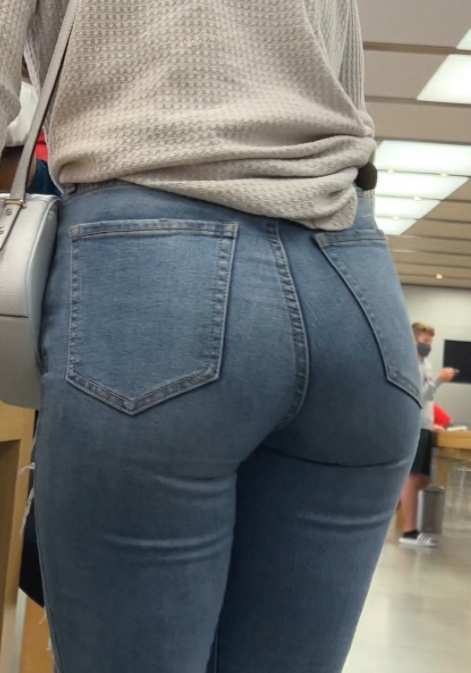 Hot Girl In Jeans In Store