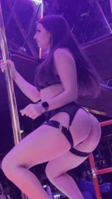 Young Brunette In The Strip Club
