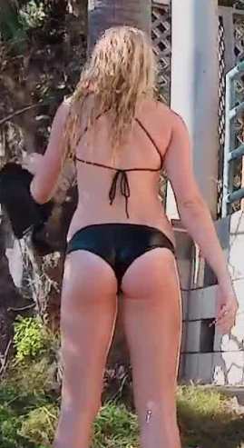 Young Teen In Black Bikini Climbing Stairs