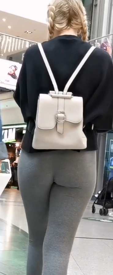 JB Blonde Teen With Pigtails and Tight Leggings