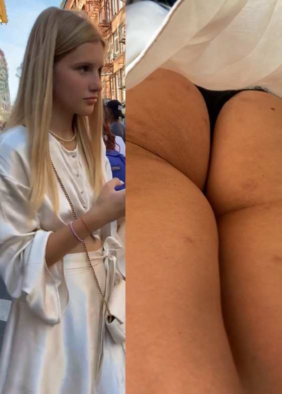 Lifting Blonde's Dress