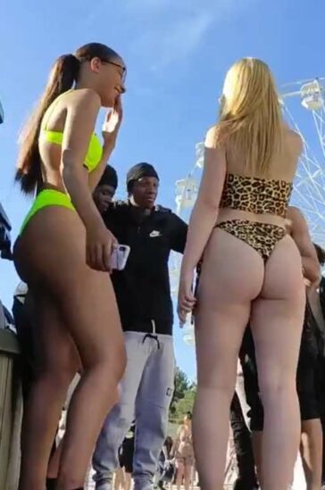Two Thonged Girls Flirting With Guys