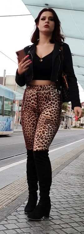 Prostitute Looking Brunette In Leopard Leggings