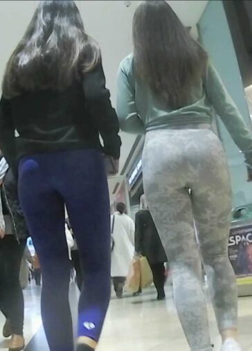 Two Young Teens In Leggings InThe Mall