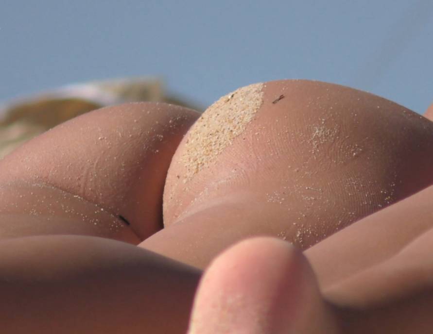 Two Young Bunnies In Thong On The Beach