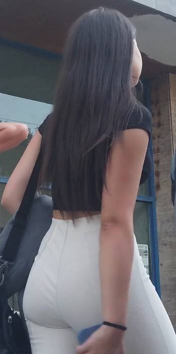 Long Hair Brunette Teen In White Pants