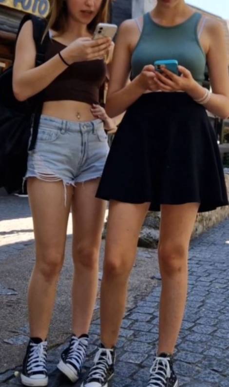 Two Hot Sisters In Amusement Park