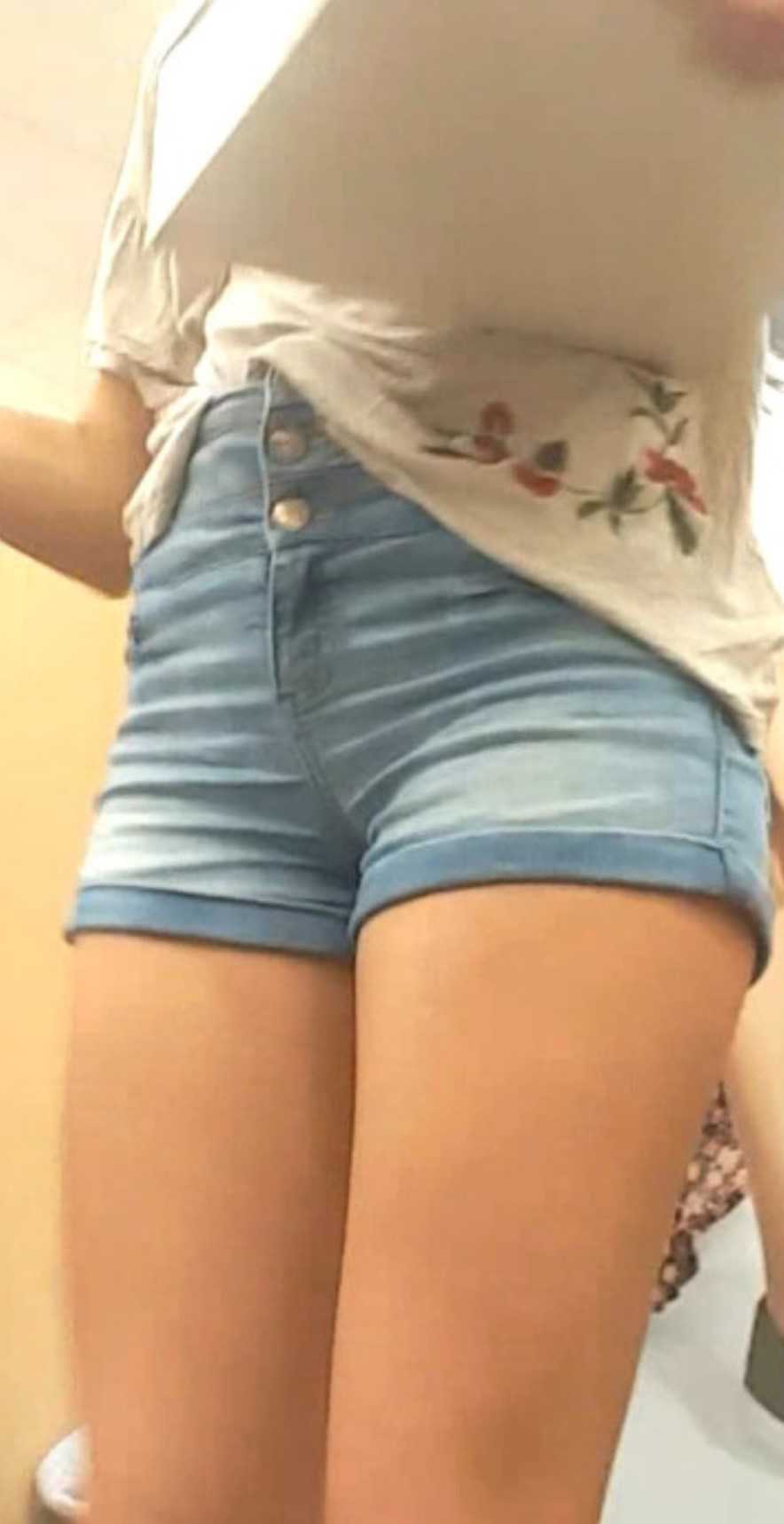 Cute Teen Trying On High Heels