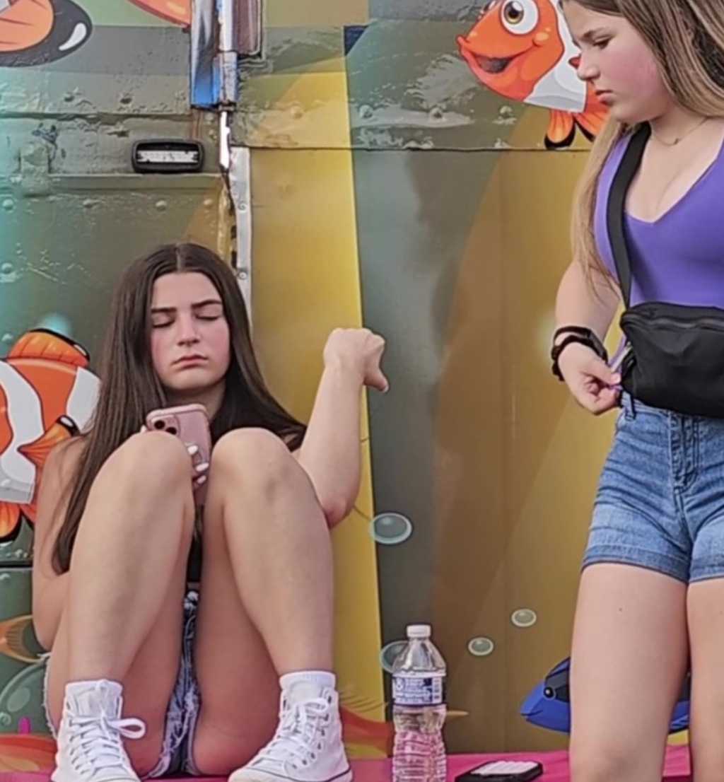 Teen Duo In Shorts Taking a Break